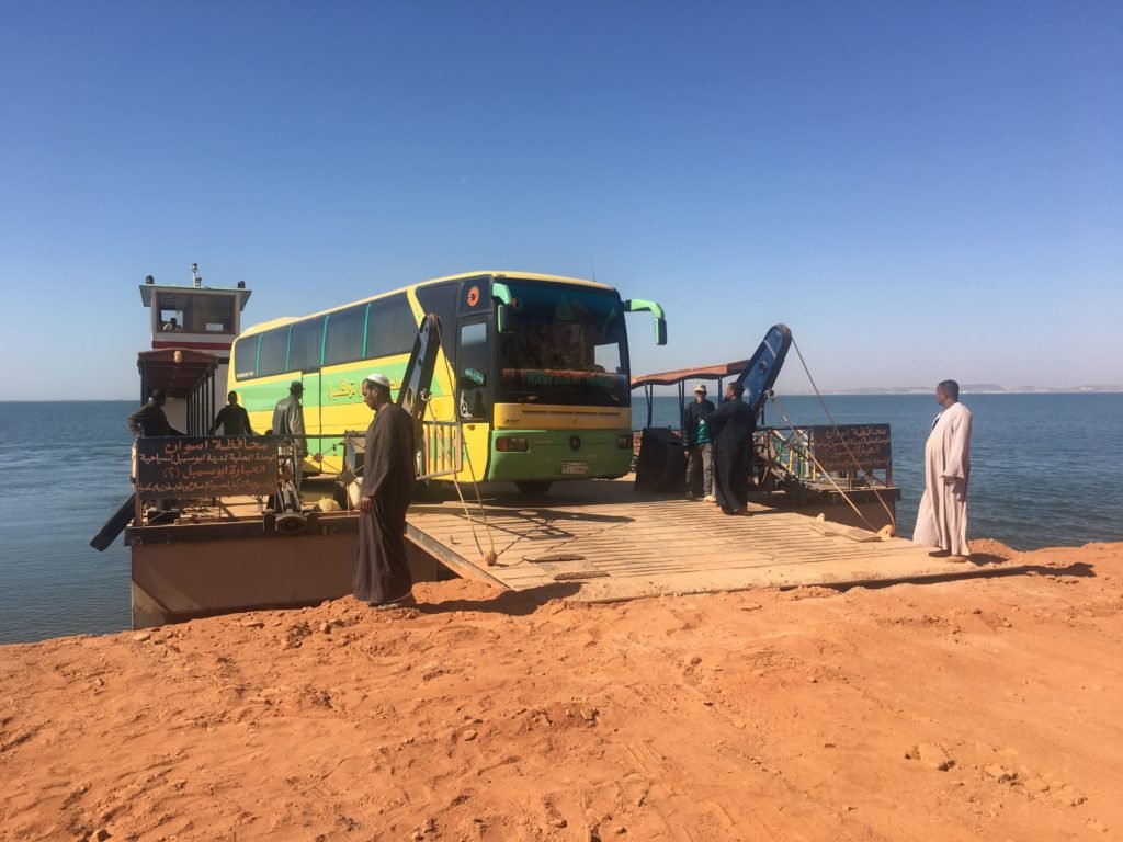 Disembarking the bus and passengers from the ferry