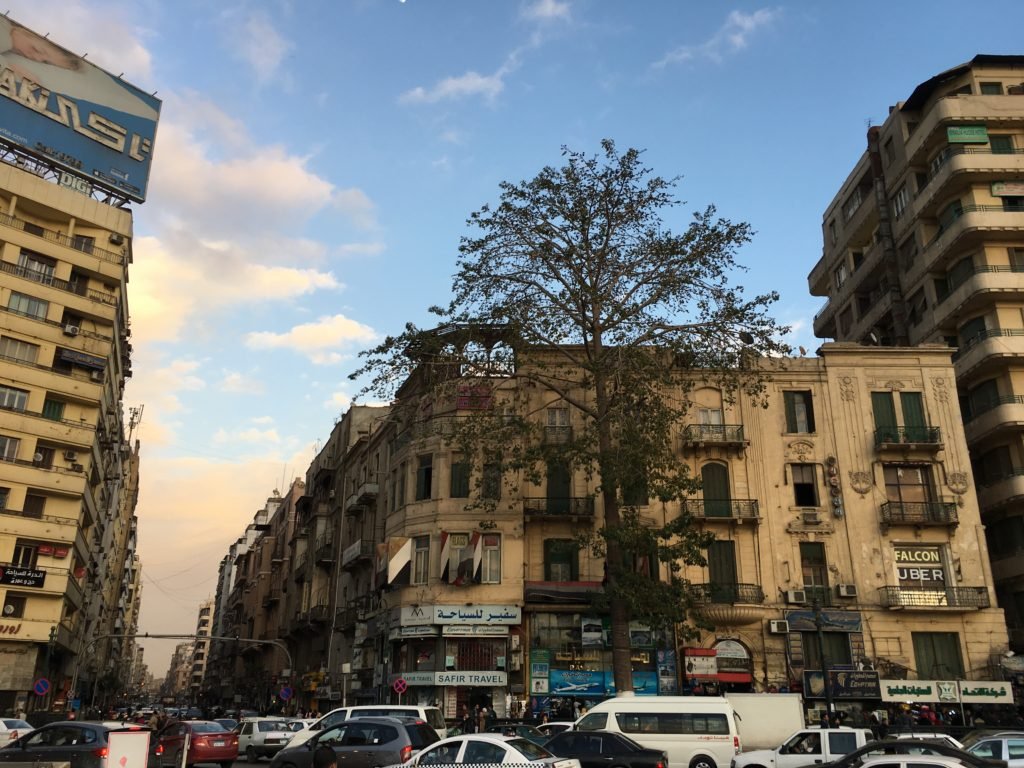 Crossing through traffic in Tahrir square, Cairo