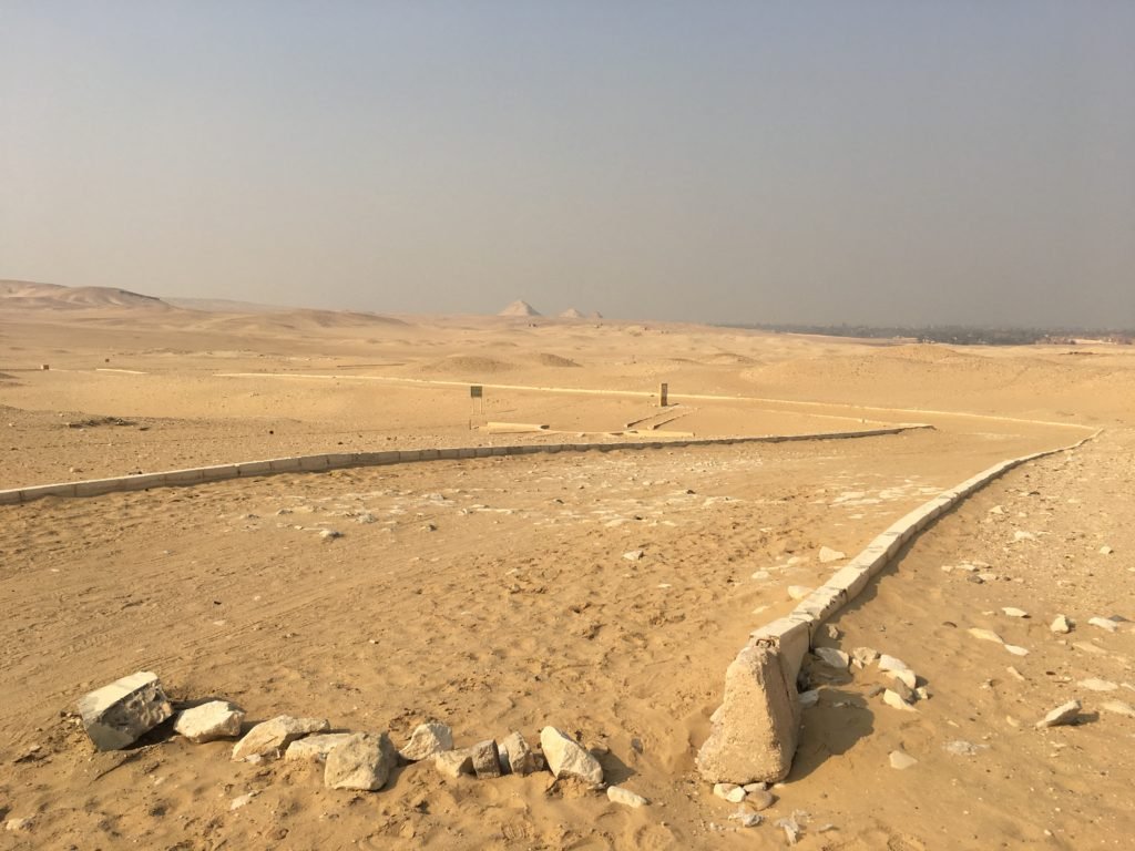 Sand and dunes on the surface conceal underground mastabas, Saqqara necropolis