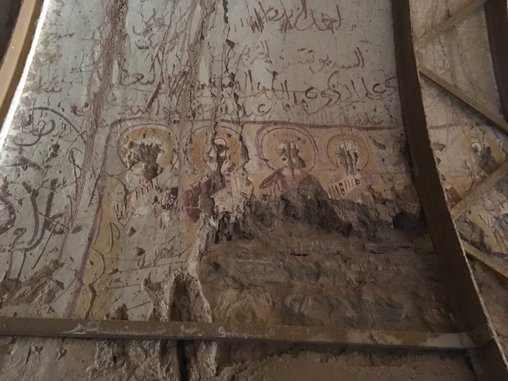 Grafittis and Coptic frescos in the corridor