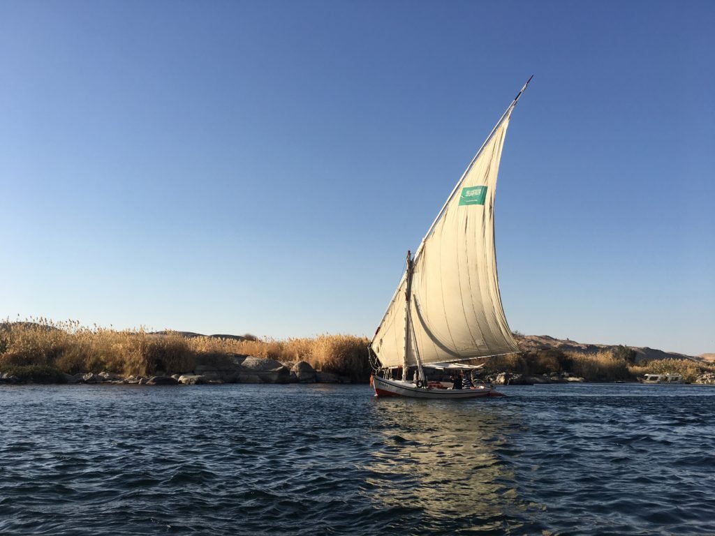 Felucca sailing on the Nile's blue waters